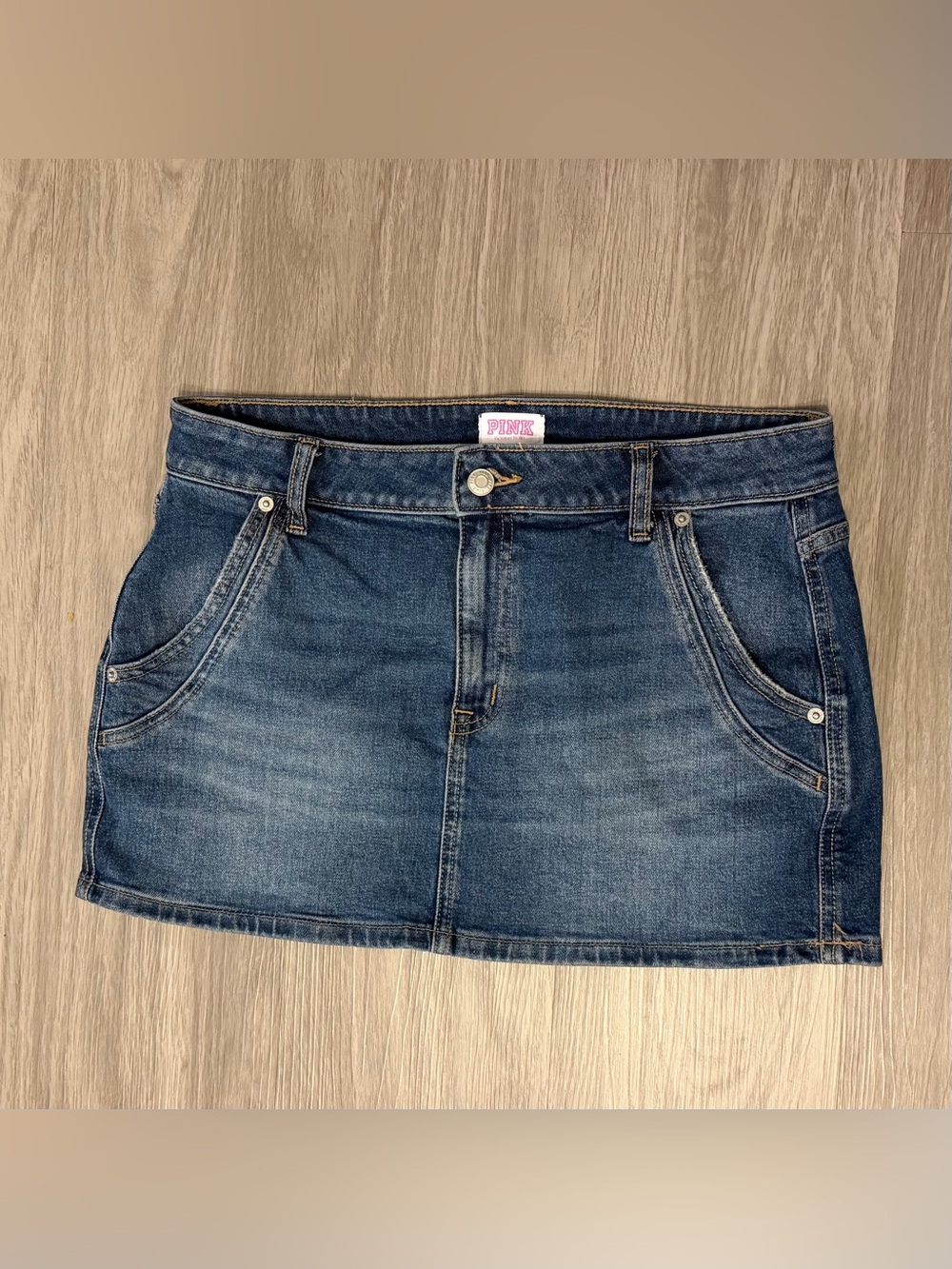 Pink denim mini skirt
